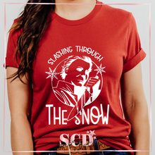 Load image into Gallery viewer, Slashing Through the Snow T-Shirt
